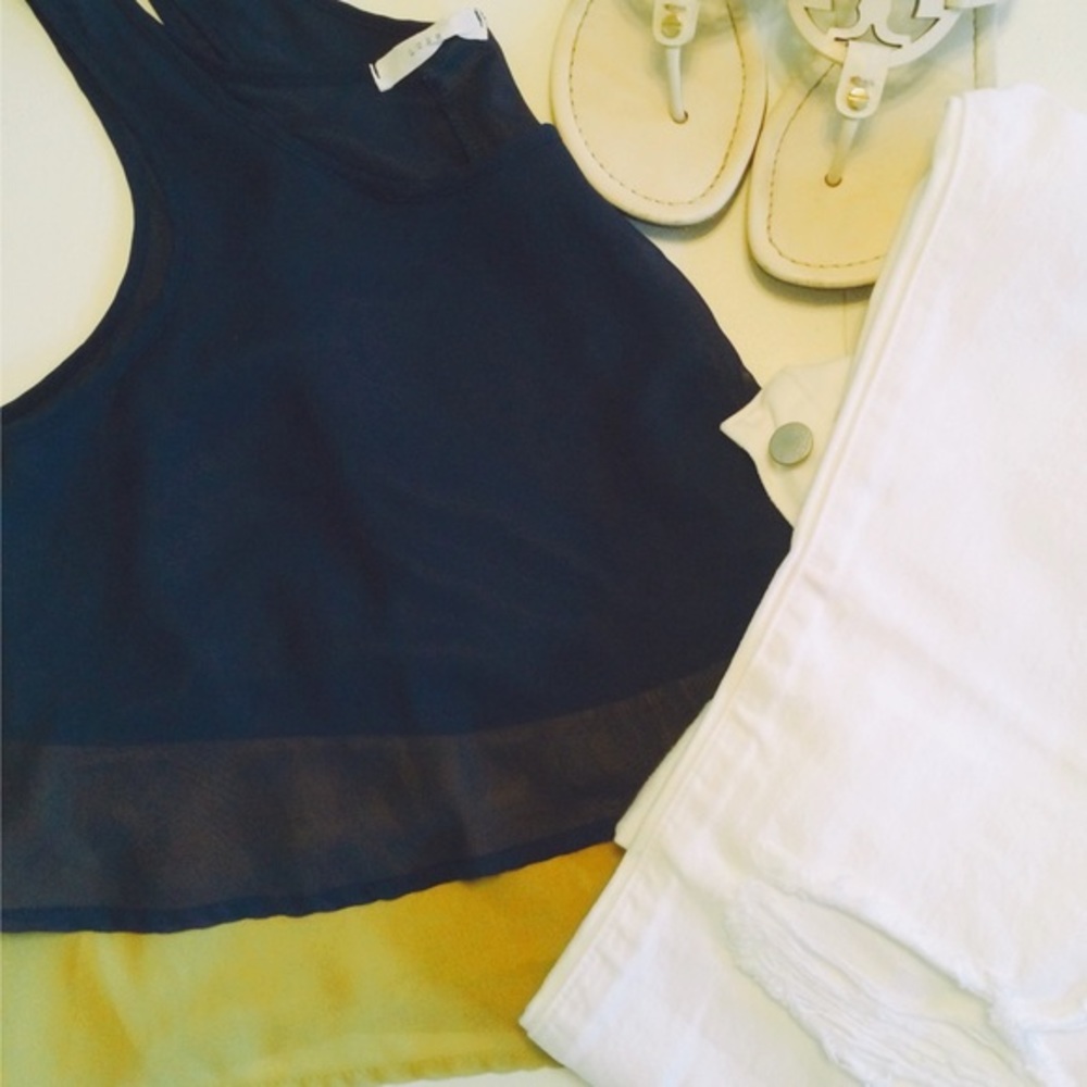 Navy and lime green cropped chiffon shirt.